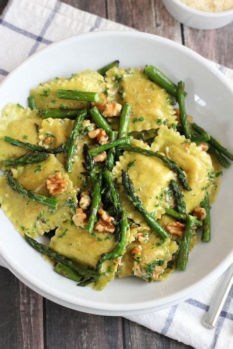 Add asparagus to melted butter. Ravioli With Sauteed Asparagus and Walnuts - Green Valley ...
