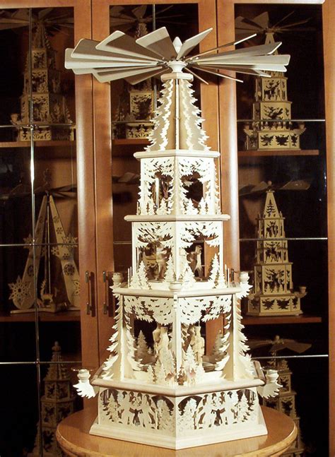 Wooden german christmas candle pyramids from the erzgebirge are handmade carousels that work like a windmill. Oh, by the way...: Schwibbogen, Christmas Pyramid, and ...