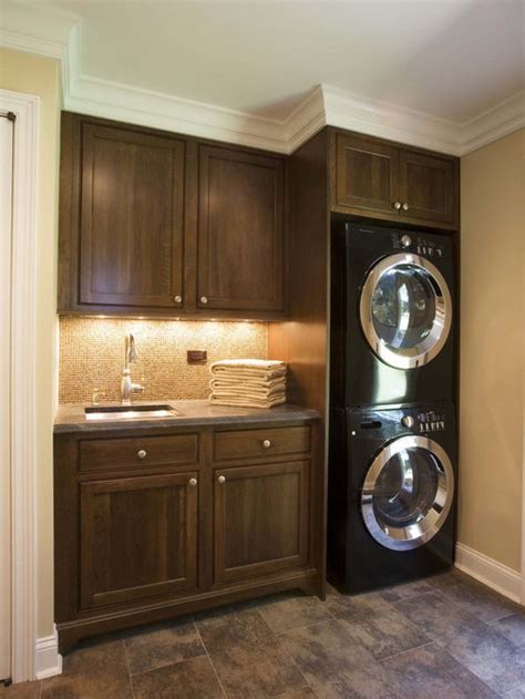 Combining a washing machine and dryer in one unit, you simply load up, select your programme and wait for your clean and dry clothes to come out the other end! Hide Stackable Washer And Dryer Ideas, Pictures, Remodel ...