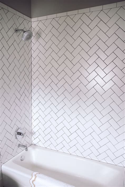 Simple White Herringbone Tiled Shower White Herringbone Tile