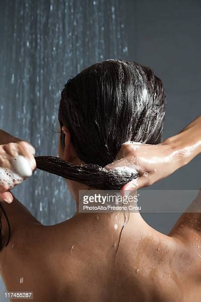 beautiful woman in a shower washing her hair photos and premium high res pictures getty images