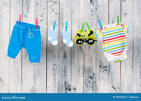 Baby Clothes Hanging On The Clothesline Stock Photo Image 30339050