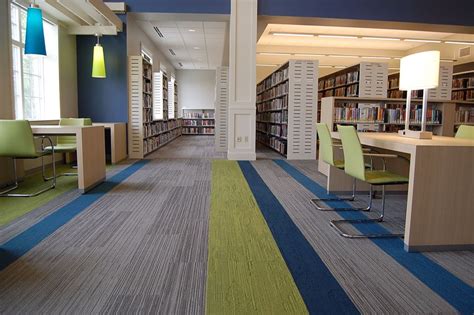 Perfect for playrooms, family rooms, and basements. Community Library | planks | Carpet tiles design, Floor ...