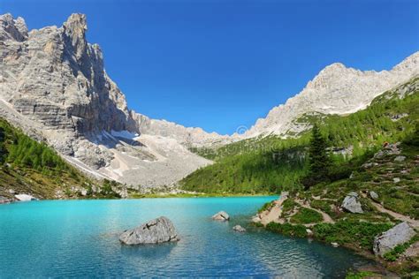 Turquoise Sorapis Lake With Dolomite Mountains Italy Europe Stock