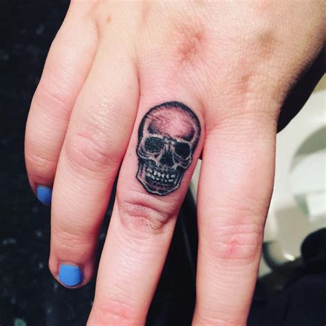 25 Cool Skeleton Hand Tattoo Designs You Should Definitely Try