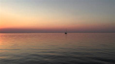 Boat Sailing On Lake Pontchartrain During Amazing Sunset Youtube
