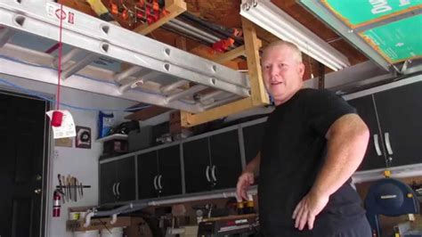 Our ladder is 16 in. Over Head Extension Ladder Storage - YouTube