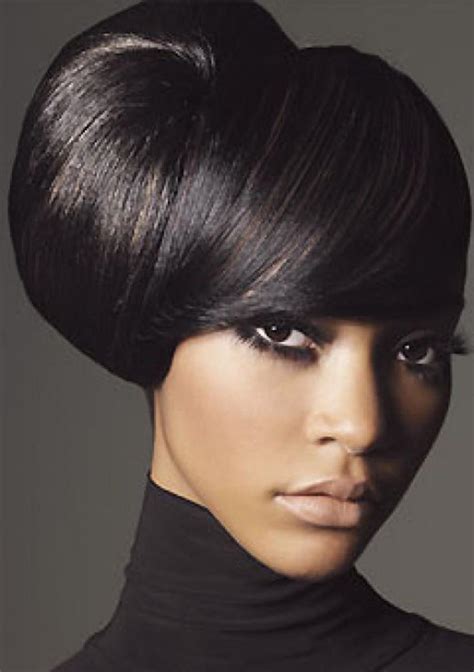 If you have long hair and are bored of your typical hairdos, try having long hair with bangs. Pictures of Updo Hairstyles for Black Women with Long Hair