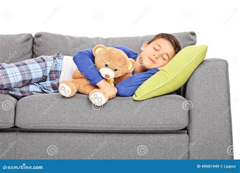 Little Boy Taking A Nap On A Couch Stock Photo Image Of Furniture