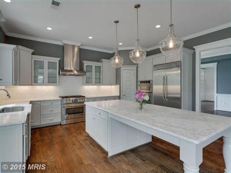 Of course, it works only if your kitchen is big enough and you have enough space for such a big kitchen island. narrow kitchen island with seating 24 - Decor Renewal