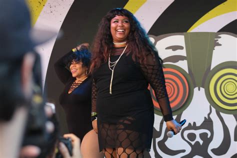 Lizzo Flaunts Her Beach Body On Full Display In New Swimsuit Photos