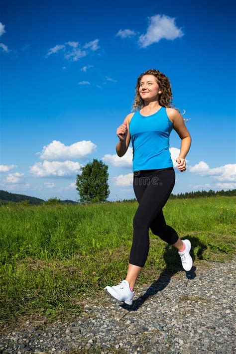 Woman Exercising Stock Photo Image Of Jogging Enjoymant 65676832