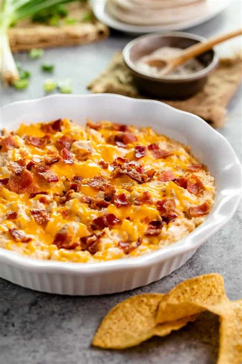 Creamy ranch dip is great, but the bacon brings it to another level. Slow Cooker Chicken Ranch Bacon Dip - The Cozy Cook