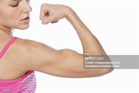 Close Up Of Woman Flexing Her Bicep High Res Stock Photo Getty Images