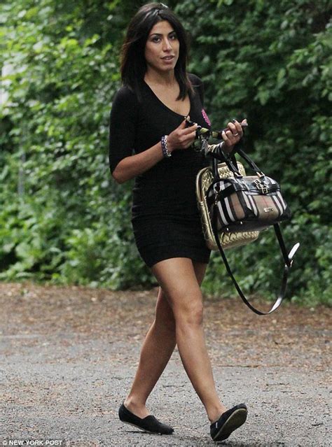 Leyla Ghodabi Flashes A Coy Smile As She Emerges Following Claims Of