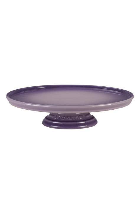 Presentation goes a long way in the dining room, and serveware is a significant part of a pleasurable eating experience. Le Creuset Stoneware Cake Stand | Nordstrom