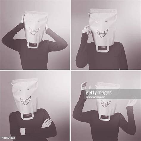 Paper Bag Head Girl Photos And Premium High Res Pictures Getty Images