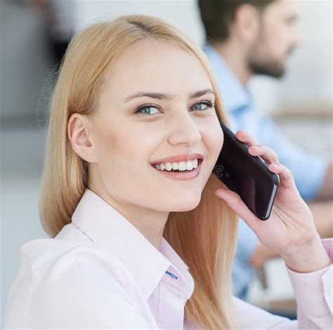 pretty woman is talking on telephone stock image image of learning male 79179845