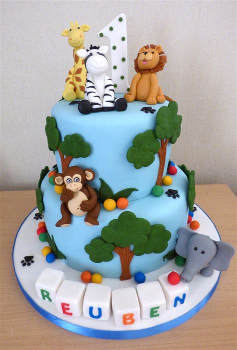 These 1st birthday cakes don't last long. 2 Tier Jungle Animal Themed 1st Birthday Cake « Susie's Cakes