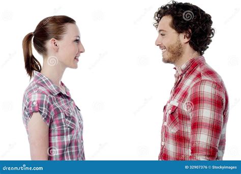 Casual Young Couple Facing Each Other Stock Photo Image Of Male