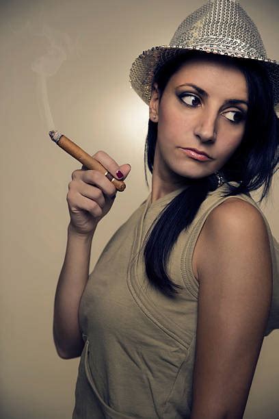 10 Young Woman With Black Hat And Gloves Smoking Cigar Stock Photos