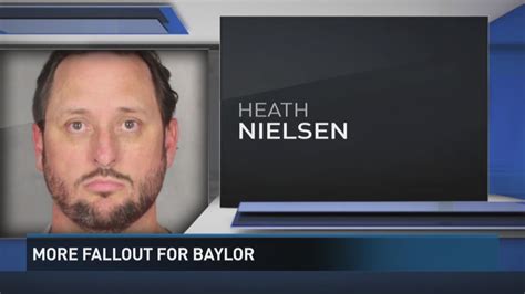 baylor associate athletic director charged with misdemeanor assault on reporter