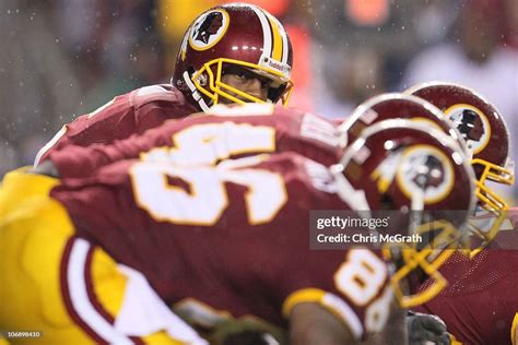 Donovan Mcnabb Of The Washington Redskins Looks Down The Line Against