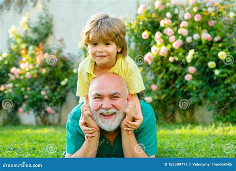 Two Different Generations Ages Grandfather And Grandson Together Grandson Embrace His