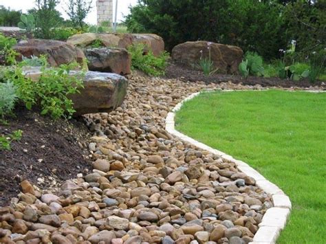 Lovely River Rocks Ideas For Front Yard Landscapes In Stone Landscaping Landscaping