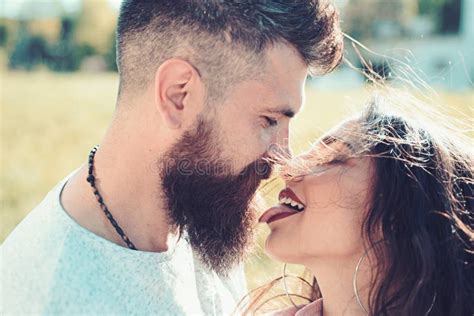 Lady With Pink Tongue Licking Bearded Macho Couple Kissing Outdoors