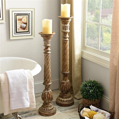 A delightful curl design and twisted iron base give it. Floor Candle Pillars - 8 Best Tall Floor Pillar Candle ...