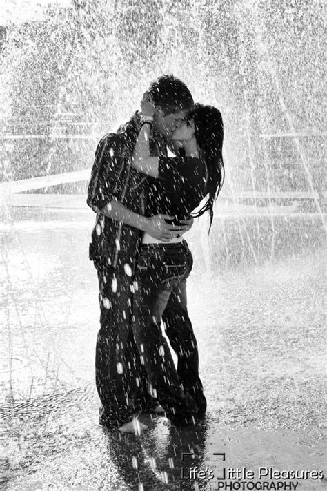 Couples Hugging In Rain