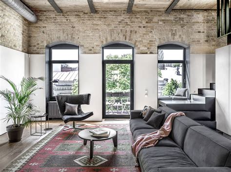 Trendy Loft Apartment With Exposed Brick Walls And Huge Windows