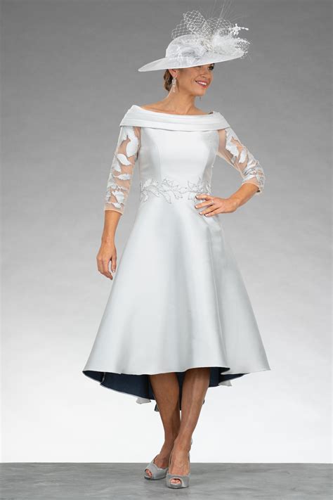 Plus behind the scenes on the photoshoot. Dipped hem dress with sleeves. IR4917S - Catherines of Partick