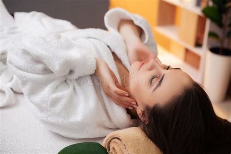 Pretty Woman Receiving A Relaxing Massage At The Spa Salon Stock Photo Image Of Indoors Girl