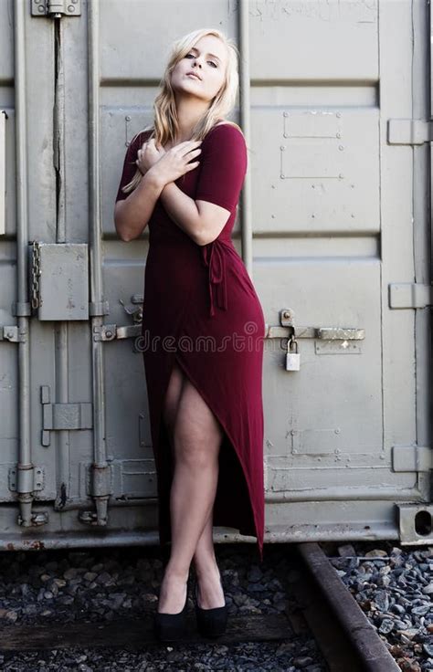 Blond Woman Standing Red Dress Outdoors Metal Container Stock Photos