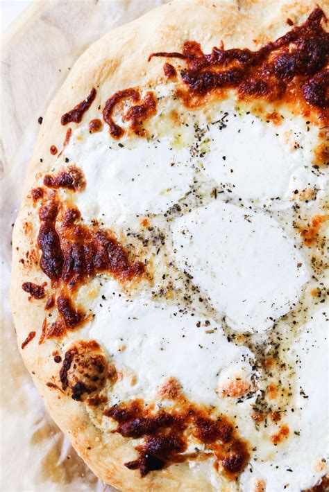 white pizza with goat cheese fresh mozzarella and balsamic glaze yes to yolks