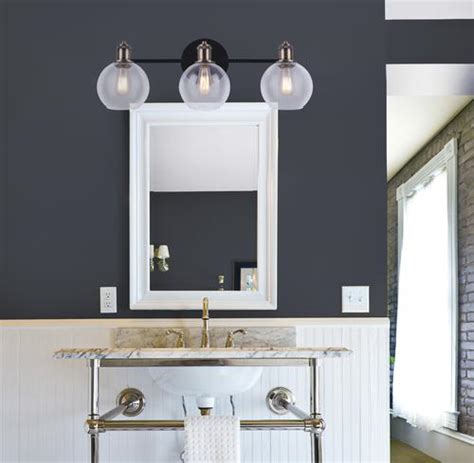 Most commonly installed above the mirror, vanity light fixtures are often used to direct light when choosing your light fixture, consider how much moisture and direct water will be exposed to it. Patriot Lighting® Karris Matte Black & Gold 3-Light Vanity ...