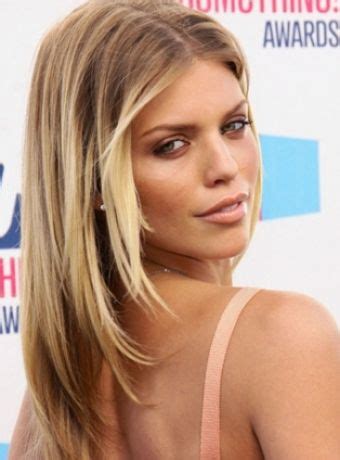 She even let the ringlets flop in her face as she wore her smart casual ensemble. center part, layers | Annalynne mccord hair, Medium curly ...
