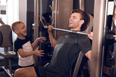 Father And Son In The Gym Father And Son Spend Time Together And Lead A Healthy Lifestyle Stock