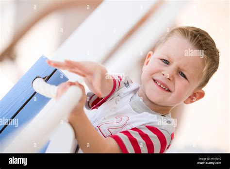 4 Years Old Boy Pulling Rope Stock Photo Alamy