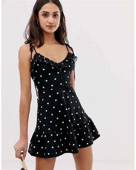 ASOS Denim Mini Sundress With Button Front And Pep Hem In Polka Dot In