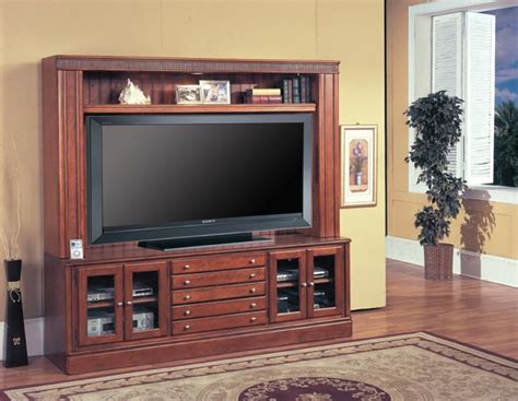 Charthouse 65 Inch Tv Entertainment Center In Honey Brown Finish By