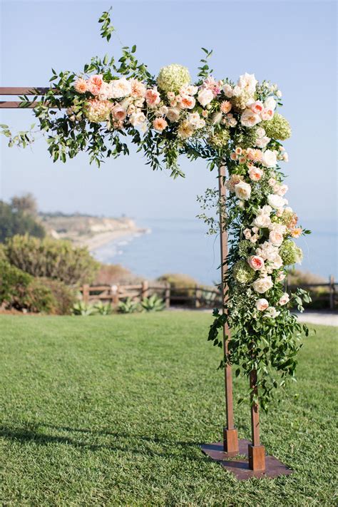 Elegant Wedding Arch Covered With Roses And Vines At The Ritz Carlton