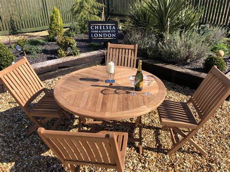 Teak garden furniture for generations. teak garden furniture folding table with 4 folding chairs ...