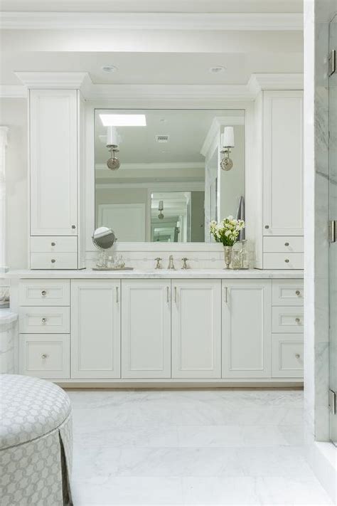 Ultimately, you achieve the vibe you're going for through the finishing touches, one of those being the hardware you choose. White Shaker Vanity Cabinets with Satin Nickel Hardware ...