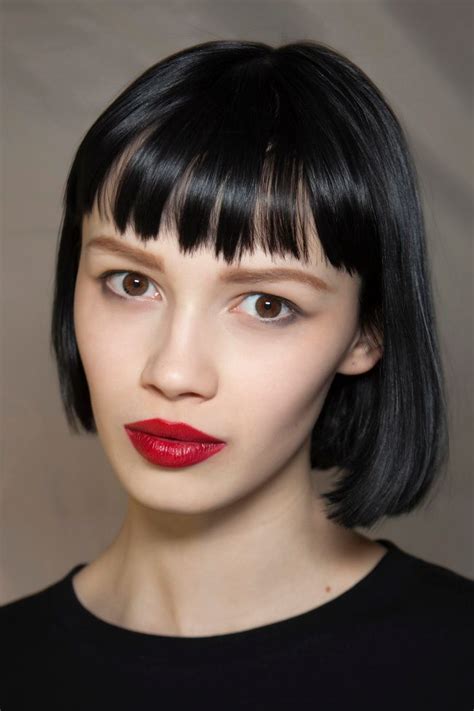 Get yourself an asymmetrical bob haircut and swipe your long bangs on one side. 12 Great Short Hairstyles With Bangs - Pretty Designs