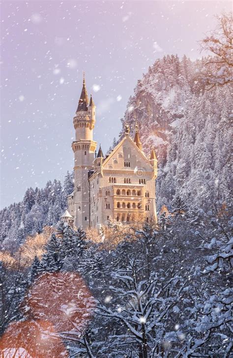 Neuschwanstein Castle During Sunrise In Winter Landscape Stock Photo