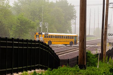 Bus Transporting Students To School On A Foggy Morning Stock Image
