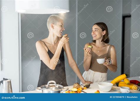 Lesbian Couple Eating Breakfast At Kitchen Stock Image Image Of